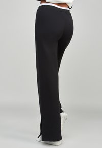 SIKSILK WIDE LEG - Teplákové kalhoty - black