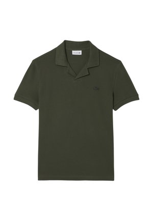 Donkergroene poloshirt van katoen, met een klassieke twee-knopen sluiting en een subtiele logo op de linkerkant van de borst. Korte mouwen.