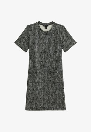 Jurk met korte mouwen in een zwart-wit gespikkeld patroon, voorzien van een ronde halslijn en een rechte pasvorm. Gemaakt van textuurstof.