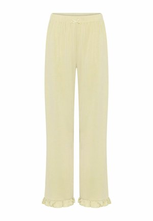 Pantalones de pijama de color amarillo claro, hechos de una tela suave, con una cinturilla elástica que presenta un lazo decorativo y bordes rizados en los bajos.