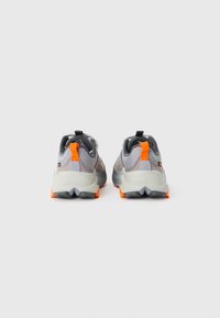 Gray and orange athletic shoes feature a textured mesh upper, cushioned sole, and a contrasting bright orange heel pull tab.