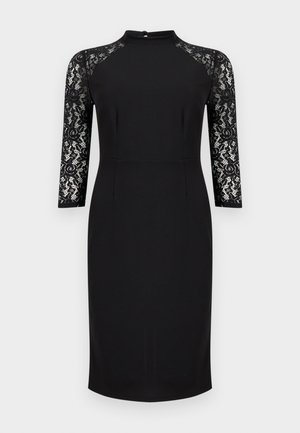 Μαύρο φόρεμα μήκους έως το γόνατο με μανίκια τριών τετάρτων από δαντέλα και μικρό κούμπωμα με κουμπιά στην πλάτη στο άνοιγμα του λαιμού.