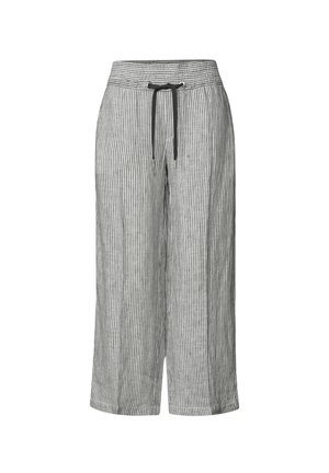 Pantalon ample mi-long avec des rayures verticales noires et blanches, taille élastique et lien noir à l'avant.