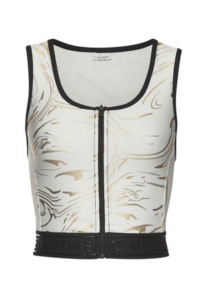 White athletic crop top with gold marble pattern, black trim, and a front zipper. Features a black elastic waistband with embossed lettering.