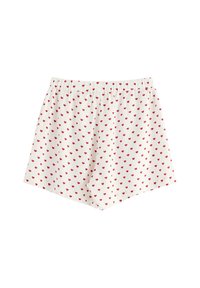 Pantaloni corti bianchi con un motivo ripetuto di piccoli cuori rossi. Vita elastica, tessuto traspirante, vestibilità rilassata, adatti per un look informale.