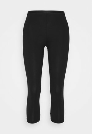 Leggings neri realizzati in materiale elasticizzato, con un'ampia vita senza cuciture e una lunghezza cropped, caratterizzati da una texture liscia e opaca.