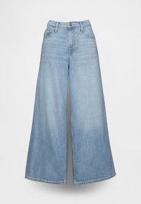 Lichtblauwe wijde jeans van denim, met een hoge taille, voorzakken en een knoopsluiting. De stof heeft een verweerde wassing.