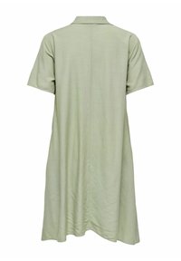 Robe courte à manches courtes, vert clair, longueur aux genoux avec un col, vue de dos sur un fond blanc uni.