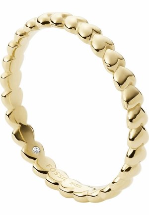 Bague liée en forme de cœur ton or avec un petit accent de pierre précieuse claire sur un cœur.