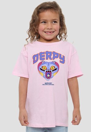 Pink cotton t-shirt featuring a graphic design of a blue bear face with large yellow eyes and the text "DERPY" in orange. Short sleeves, relaxed fit.