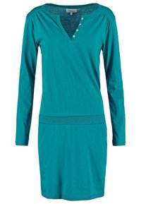 Teal pitkähihaisessa mekossa on pehmeää puuvillaa, jossa on V-pääntie nappikoristeilla ja smockattu vyötärö, joka muotoilee vartalon.