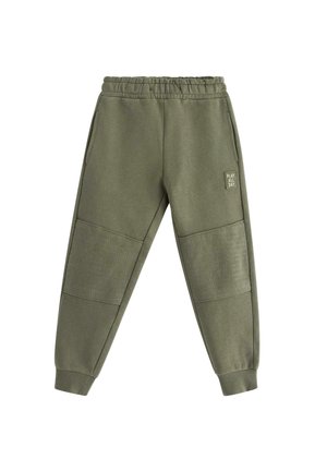 Olijfgroene joggingbroek van zachte stof, met een elastische tailleband, zijzakken en textuurpaneelaccenten op de onderbenen.