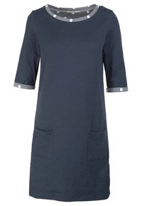 Robe en coton bleu marine avec des manches trois-quarts, des accents à pois gris sur les poignets et le col, et deux poches avant.