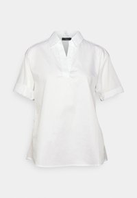 Vit skjorta med korta ärmar tillverkad av slät tyg, med knäppslå vid halsen, uppvikta ärmar och sidosprund för en avslappnad passform.