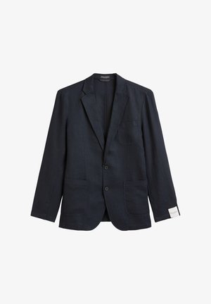 Granatowa lniana marynarka z wykładanymi klapami, dwoma przednimi kieszeniami i zapięciem na jeden guzik. Posiada kieszeń naszywaną oraz minimalne detale krawieckie.