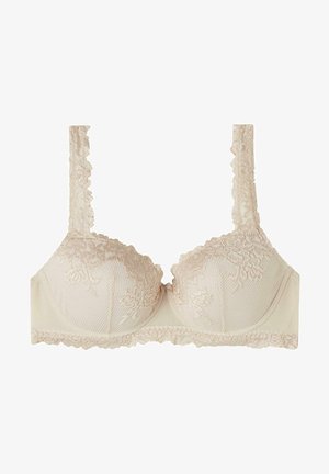 Beige kant-bh met beugel, gestructureerde beker en golvende randen. Verstelbare straps met bloemmotieven langs de band en de halslijn.