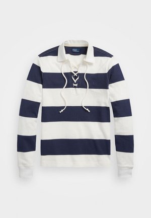 Maillot de rugby à manches longues avec larges rayures horizontales bleu marine et blanches, col en V à lacets et col blanc.