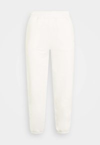 Hvite joggebukser laget av mykt stoff, med elastisk midje, smale ankler og en jevn tekstur uten synlige mønstre.