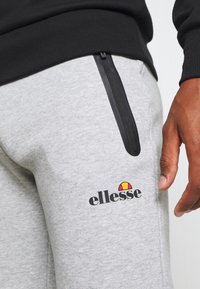 Ellesse Teplákové kalhoty - grey