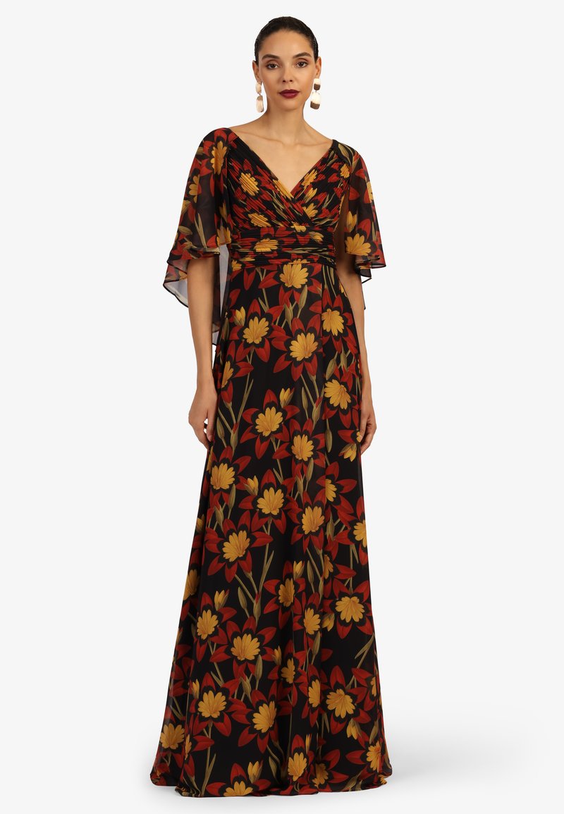 Maxi-Kleid aus schwarzem Stoff mit einem gelb-roten Blumenmuster. Kurze Flatterärmel und ein V-Ausschnitt mit einem taillierten Oberteil.