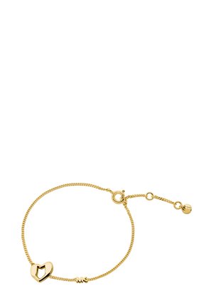 Bracelet en or avec un charm en forme de cœur à centre ouvert, maillons de chaîne texturés et un fermoir sécurisé avec longueur ajustable.