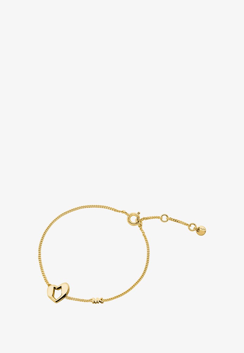 Złota bransoletka z zawieszką w kształcie serca z otwartym środkiem, teksturowanymi ogniwami łańcuszka oraz bezpiecznym zapięciem o regulowanej długości.