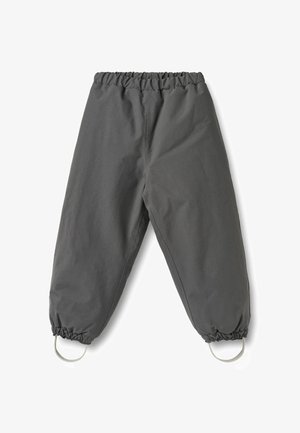 Pilkos vandeniui atsparios kelnės su elastinga juosmens juosta, surinktais rankogaliais ir kilpelėmis apačioje. Pagamintos iš lygios, tvirtos medžiagos.