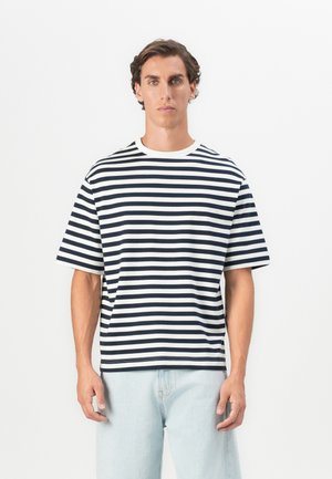 Striped t-shirt with navy and white horizontal stripes, round neckline, short sleeves, made of cotton blend fabric, relaxed fit.