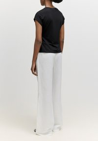 EDITED IHANA - T-shirt print - schwarz