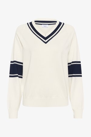 Krémszínű, V-nyakú kötött pulóver, sötétkék csíkokkal az ujjakon és a galléron. Puha anyagból készült, bordás mandzsettákkal és aljjal.