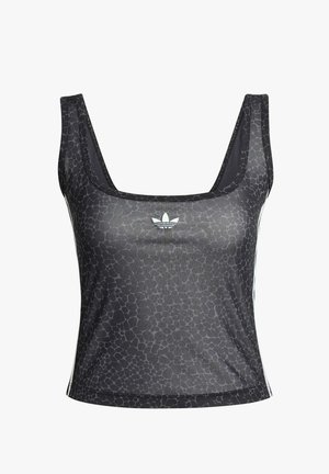 Top corto nero con motivo sottile a rettile e logo Adidas trefoil bianco centrato sotto la scollatura quadrata.