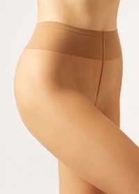 Beżowe, półprzezroczyste legginsy o gładkiej fakturze i bezszwowym pasie, charakteryzujące się wysokim stanem, który zapewnia dopasowaną sylwetkę.