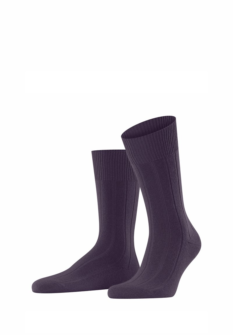 Dunkelviolette Rippensocken mit einem einfarbigen Muster, ausgestattet mit einer verstärkten Ferse und Zehen, sowie einem bequemen Bündchen an der Oberseite.