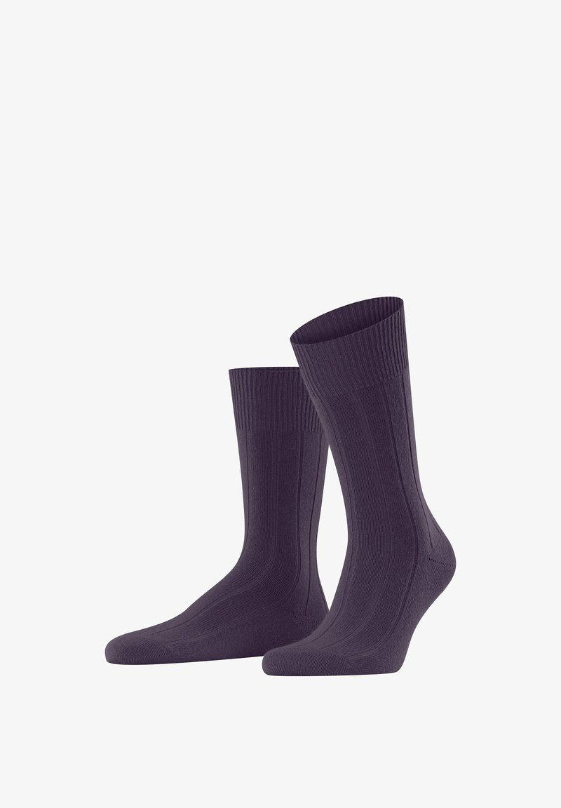 Calze a coste di colore viola scuro con un motivo uniforme, dotate di tallone e punta rinforzati e un bordo comodo nella parte superiore.