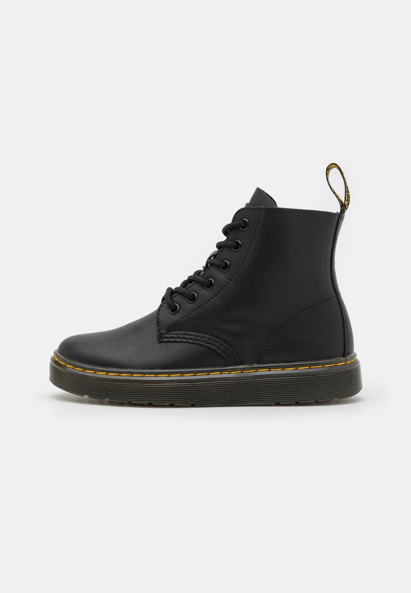 Black leather ankle boots with round toe, lace-up front, and yellow stitching detail along the sole. Features a pull tab at the heel.