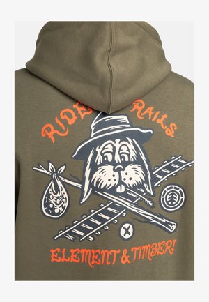 Olive green hoodie featuring a graphic of a cartoon dog with a hat, crossed logs, and a bag. Text reads "RIDE THE RAILS" and "ELEMENT & TIMBER."