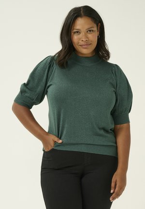 Dark green, short-sleeved sweater with a high neck and puffed sleeves. Made of glittery material with a fitted waistband.