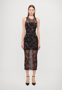 Black dress with floral pink patterns, fitted design, and sheer fabric. Length extends to mid-calf with a subtle texture and outline.