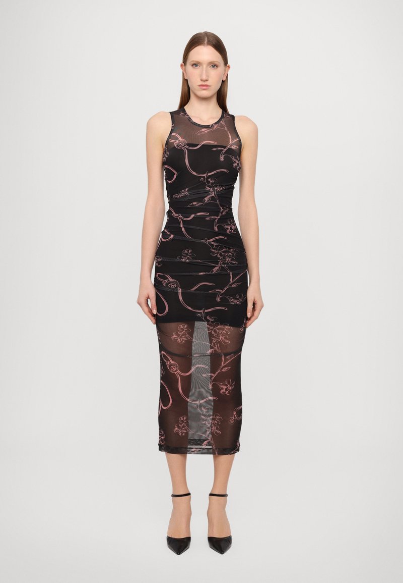 Black dress with floral pink patterns, fitted design, and sheer fabric. Length extends to mid-calf with a subtle texture and outline.