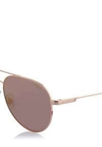Goldene Pilotenbrille mit braunen Gläsern, dünnem Metallrahmen und einem dezenten Carrera-Logo auf dem Glas. Verfügt über verstellbare Nasenpolster.