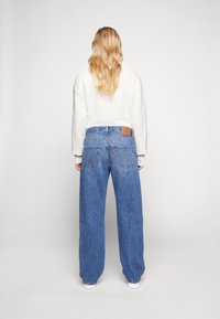 Levi's® Vaqueros rectos - stone blue denim