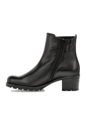 Bottine en cuir noir avec une finition lisse, fermeture éclair sur le côté et un talon bloc. Conçue avec un bout arrondi et une semelle texturée pour une meilleure adhérence.