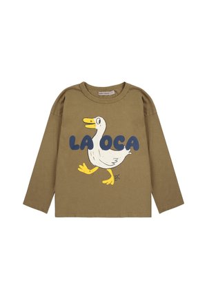 Long-sleeve olive green cotton t-shirt featuring a white duck graphic with yellow accents and the text "LA OCA" in blue.