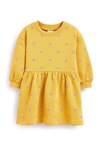 Vestido de algodón amarillo con mangas largas, falda fruncida y pequeños patrones de arcoíris en toda la prenda. Presenta un cuello redondo y puños elásticos.