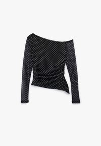 Sort, langærmet top med off-shoulder design; har hvide prikker, samlet side og en glat stofstruktur.