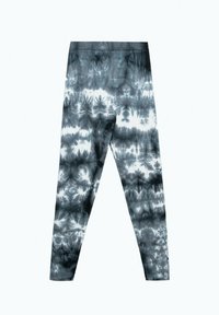 Collant con motivo tie-dye in tonalità di grigio e bianco, con una texture liscia e una vita alta per comfort e vestibilità.