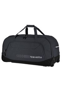 Un bolso de viaje tipo duffel en gris oscuro con una superficie texturizada, asas dobles y un bolsillo frontal con cremallera, presentado con el logo "travelite" en plata.