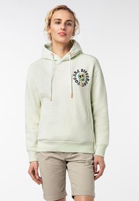 Lichtgroene hoodie met een voorste kangoeroe zak, verstelbare trekkoorden en een cirkelvormige graphic met de tekst "Jij bent anders." Zachte textuur.