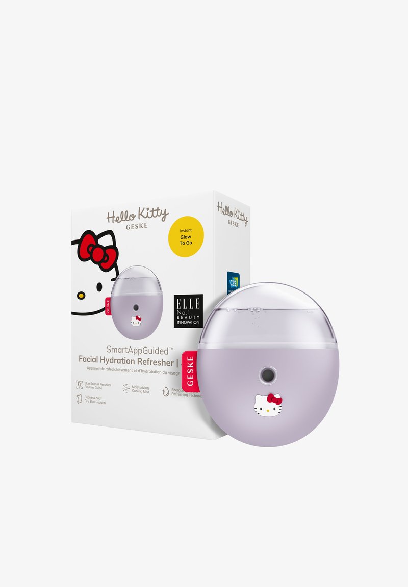 Brume hydratante pour le visage Hello Kitty à la lavande. Design rond avec un dessus transparent. La boîte présente une illustration du personnage et les détails du produit.