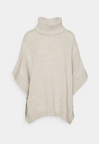 Beige gestrickter Poncho mit einem hohen Kragen, kurzen Ärmeln und strukturierter Oberfläche. Verfügt über Rippdetails am Kragen und Saum.